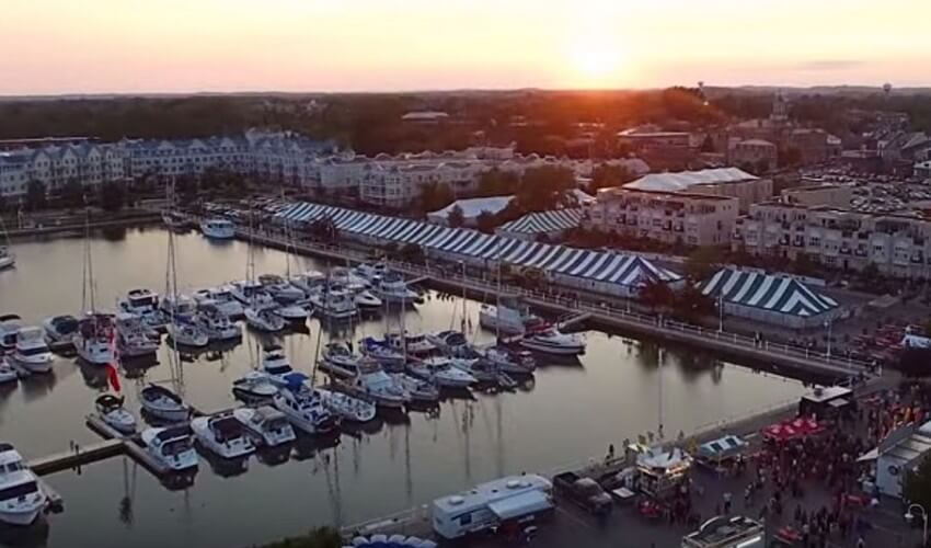 Cobourg waterfront with boats docked.