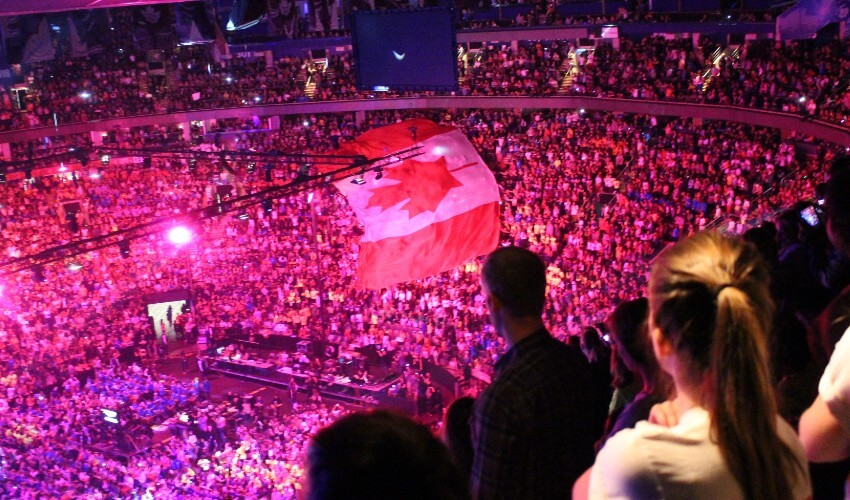 Toronto We Day event in a stadium with a full crowd.