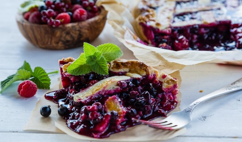 Saskatoon berry pie on the kitchen table.