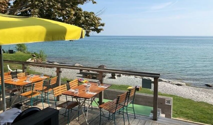 A patio with an incredible view of the water, Drake Devonshire.