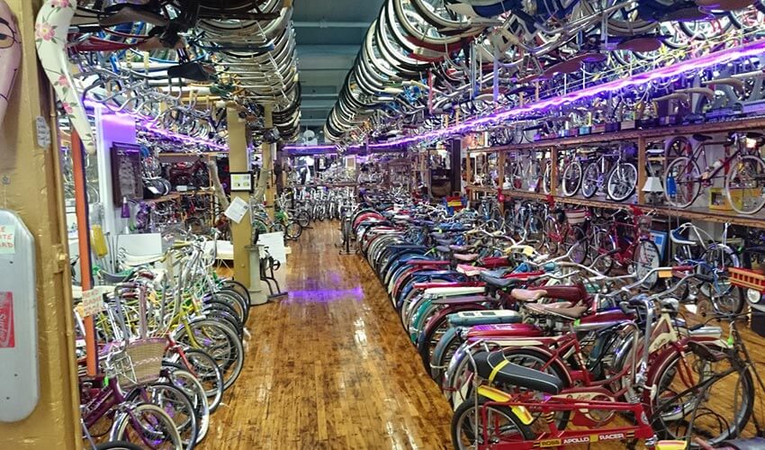 An interior space filled with bicycles in the Bicycle Heaven Museum in Pittsburgh.