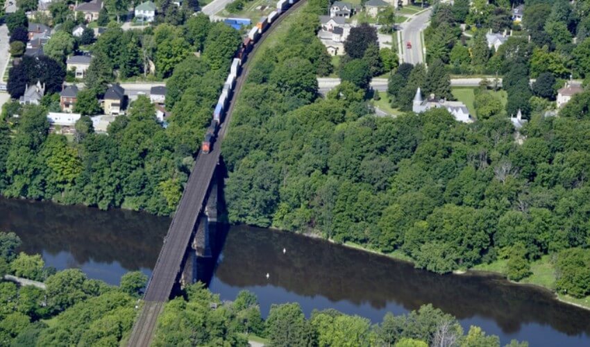 Aerial view of the Grand River, viewing the railroad bridge in Paris