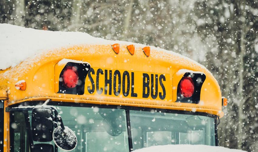 Close up view of front of school bus during winter.