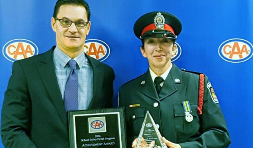 Constable Andrea Cooper receiving the School Safety Patrol Program Achievement Award.