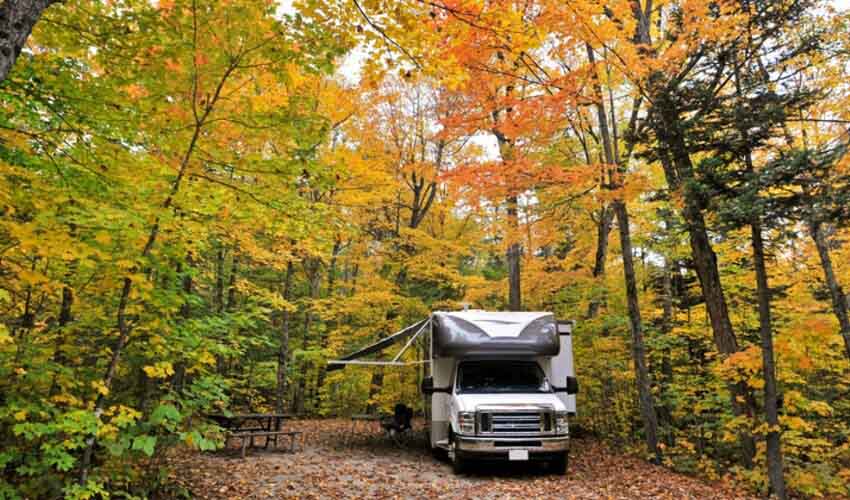 Setting up the RV at a campsite.