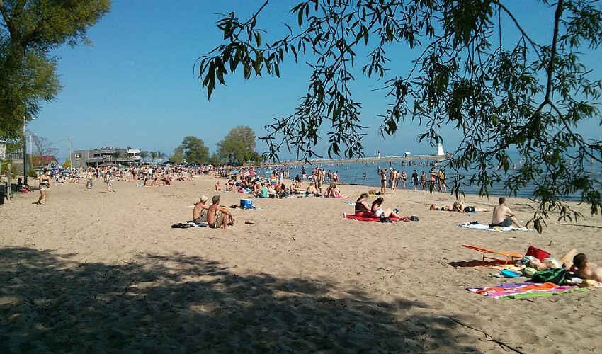 People enjoying the beach in Port Dover, Ontario.
