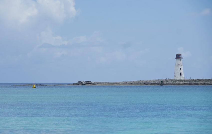 A white lighthouse at Cabbage Beach, Nassau.