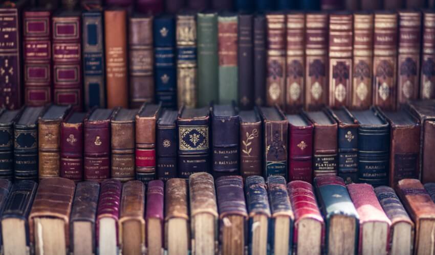 Close up of antique books on display.