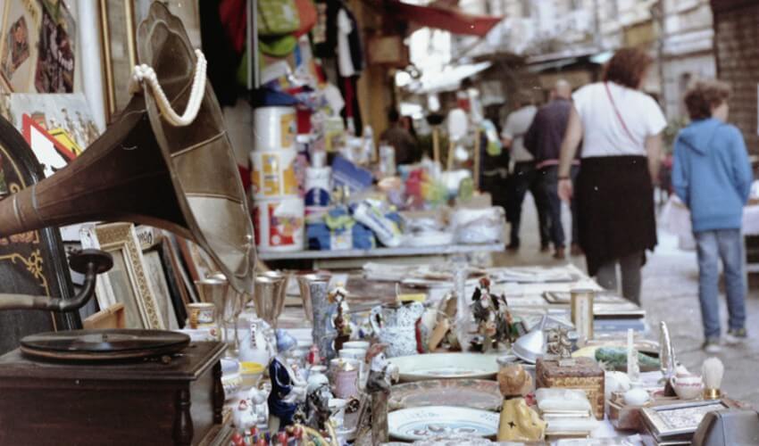 People at a market stall.
