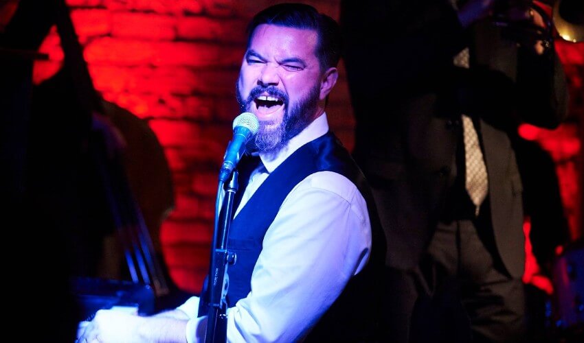 Tyler Yarema and His Rhythm singing at the Reservoir Lounge.