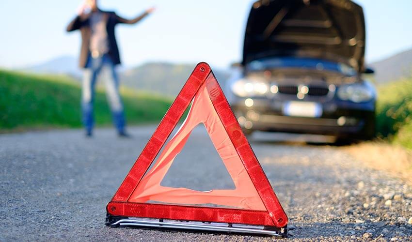 A car broken down on side of road