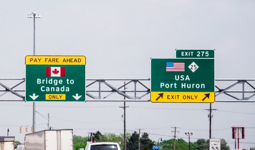 U.S. Canada border highway crossing signs.