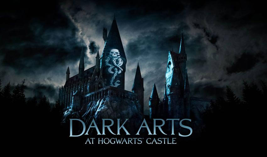 A dark and gloomy castle with a skull drawing on the front. The words "Dark Arts at Hogwarts Castle" appears at the bottom of the picture.