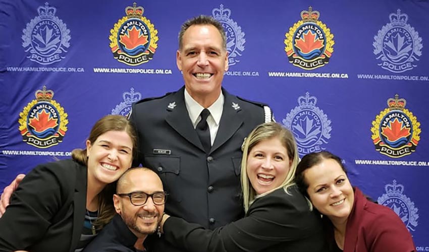 A group picture of Sergeant Barry Mungar and CAA representatives.