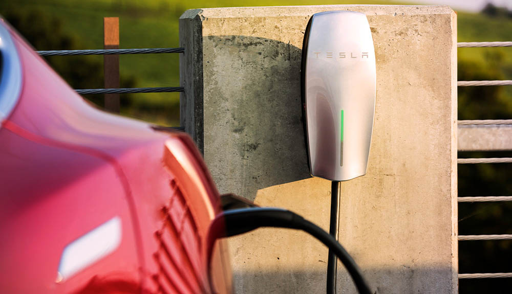 A level two charger is shown hooked up to a vehicle