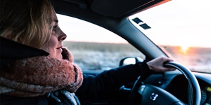 A woman drives in the winter