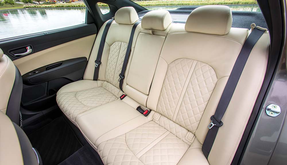 The back interior of the Kia Optima featuring heated rear seats