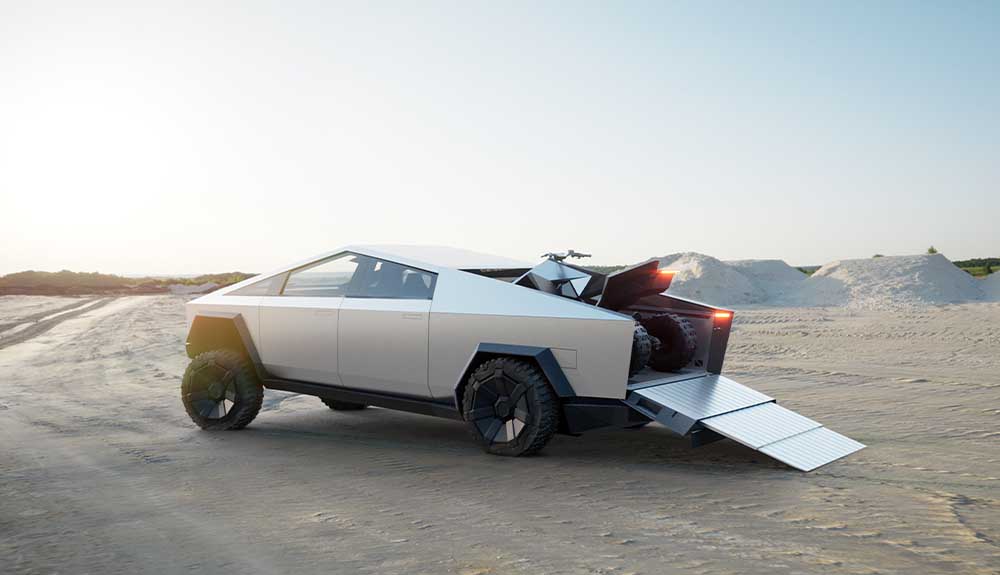 A white vehicle with a triangular shaped roof is parked on a dirt road. The wheels are rugged looking. The rear of the car is open with a ramp coming off of it and a dirt bike parked inside.
