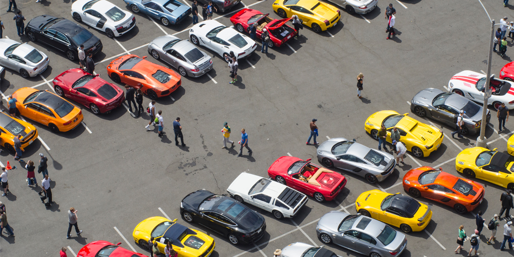 Rows of cars and spectators at auto show
