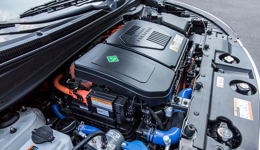 Fuel cell exposed underneath the hood of a car