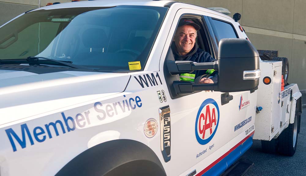 John Kimove is shown in his tow truck