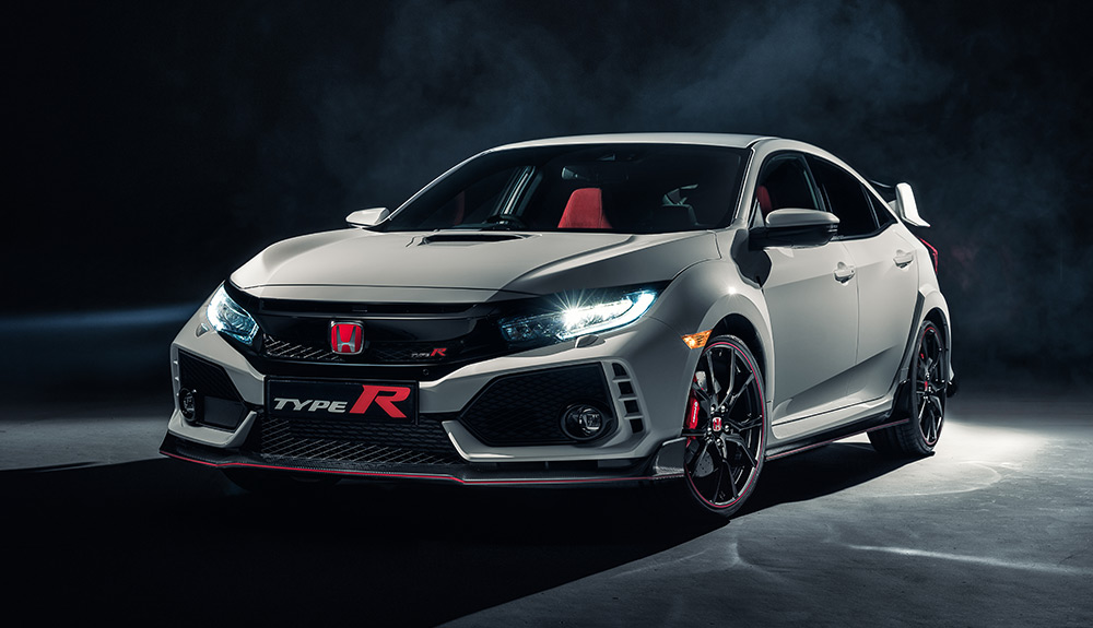 Black Honda Civic Type R with striking red details and rear wing barely visible at back of car