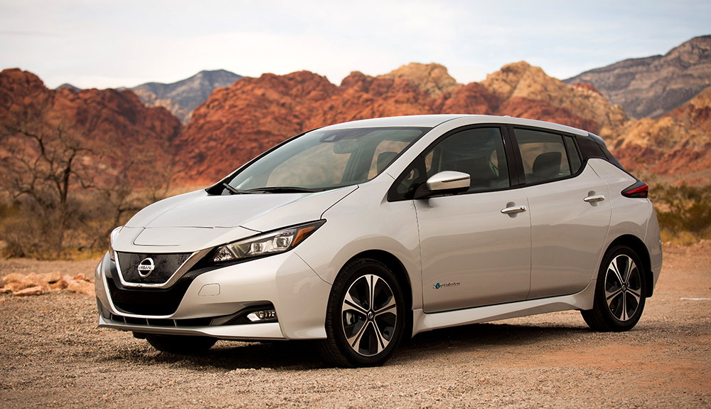 Light silver 2018 Nissan Leaf in mountainous desert setting