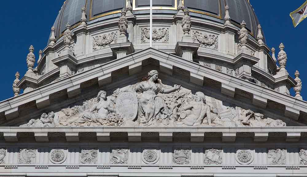 A closeup shot of the detailed carved stone at the First Church of Christ Scientist in Berkley