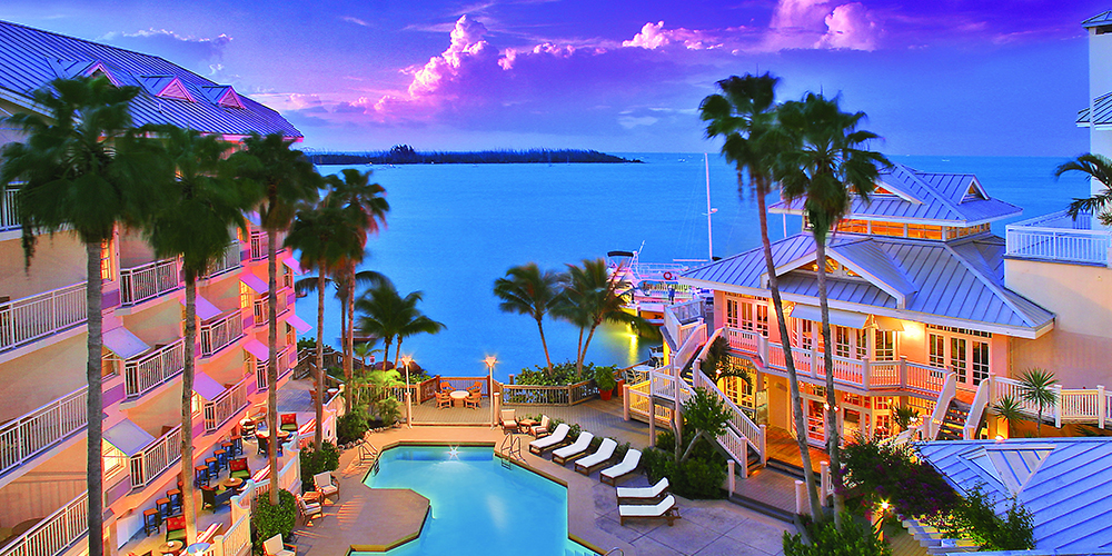 A view of the Hyatt Centric in Florida at sunset highlighting the pool and ocean view