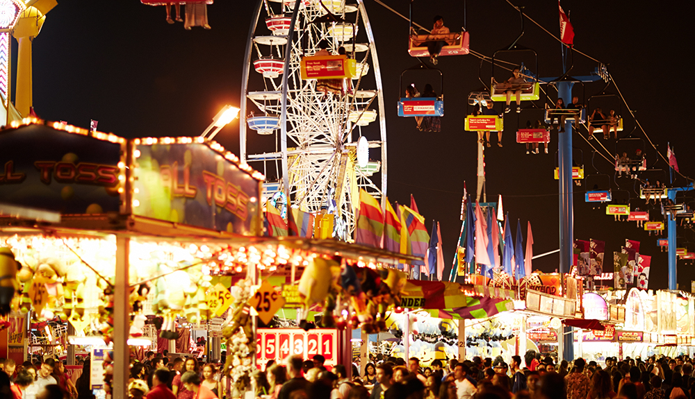 The Canadian National Exhibition's midway lit up by lights at night