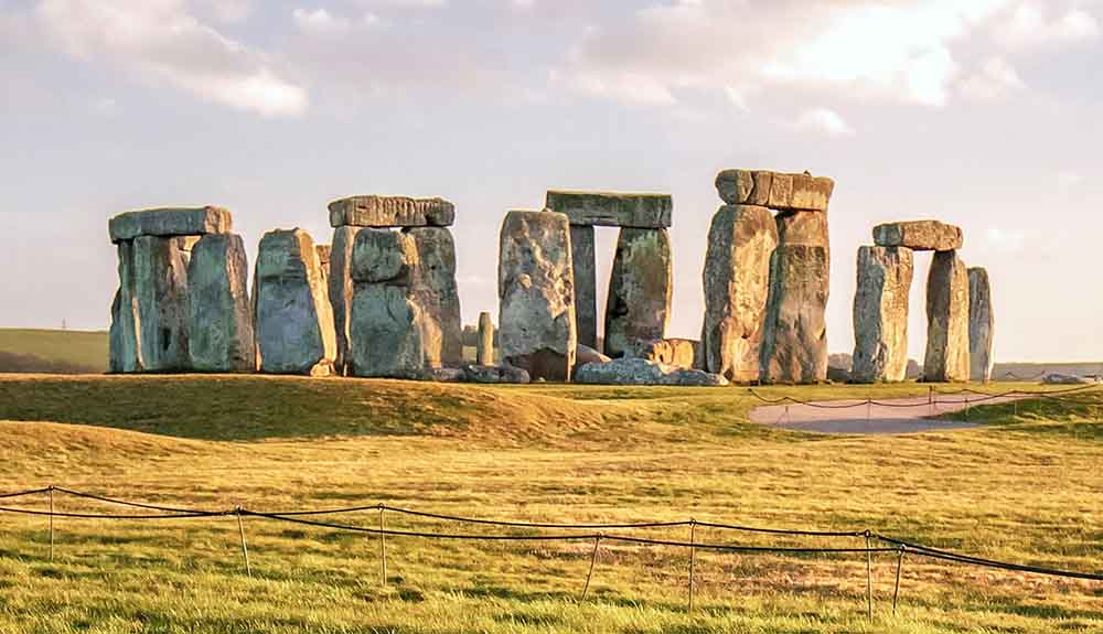 Stonehenge: a ring of 13 foot standing stones seven feet wide stand in a circle in England