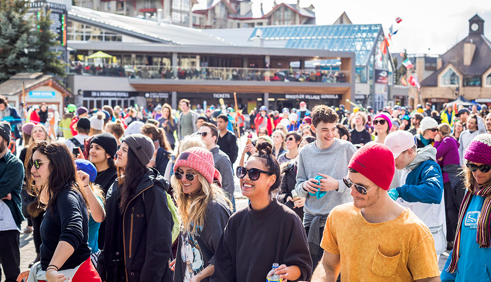 Happy people gather at the Whistler World Ski and Snowboard Festival in Whistler, British Columbia