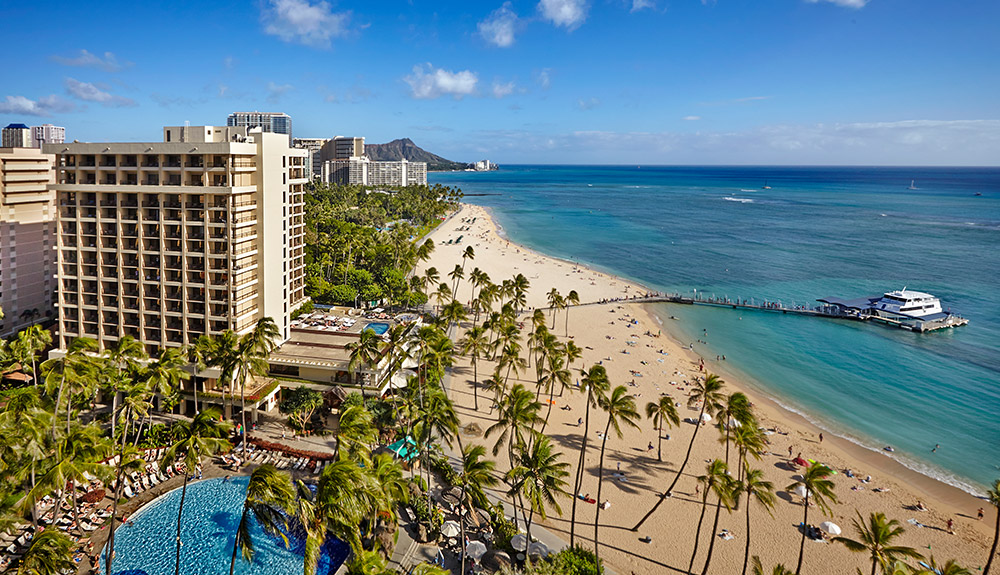 A bird's eye shot of the coastal Hilton Hawaiian Village Waikiki Resort