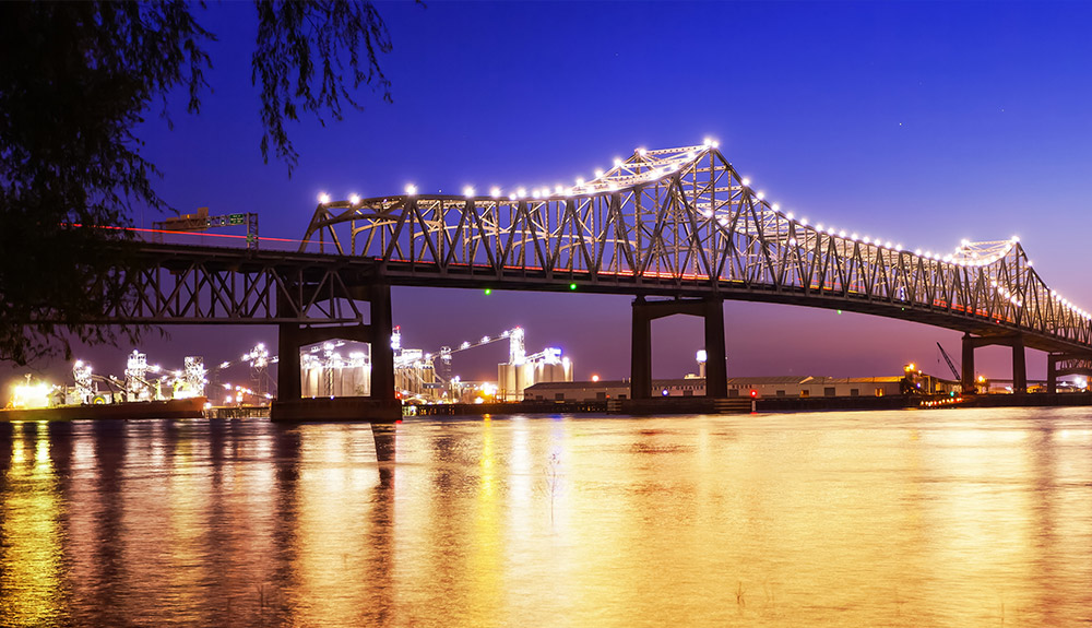 A glittering lit-up bridge is seen at night in Louisiana