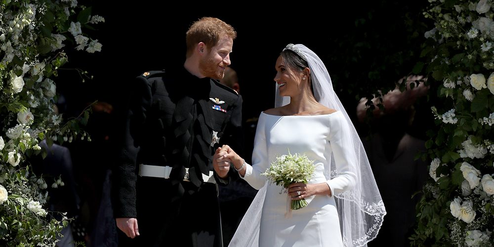 Prince Harry and Meghan Markle looking at each other on their wedding day