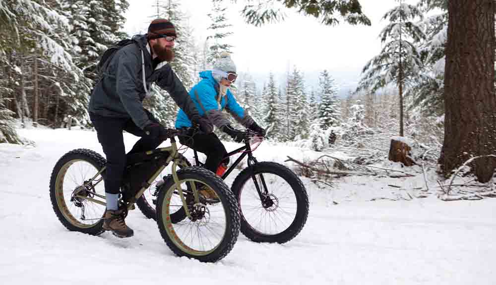 Fat biking through snowy forest at Horseshoe Resort in Ontario Canada