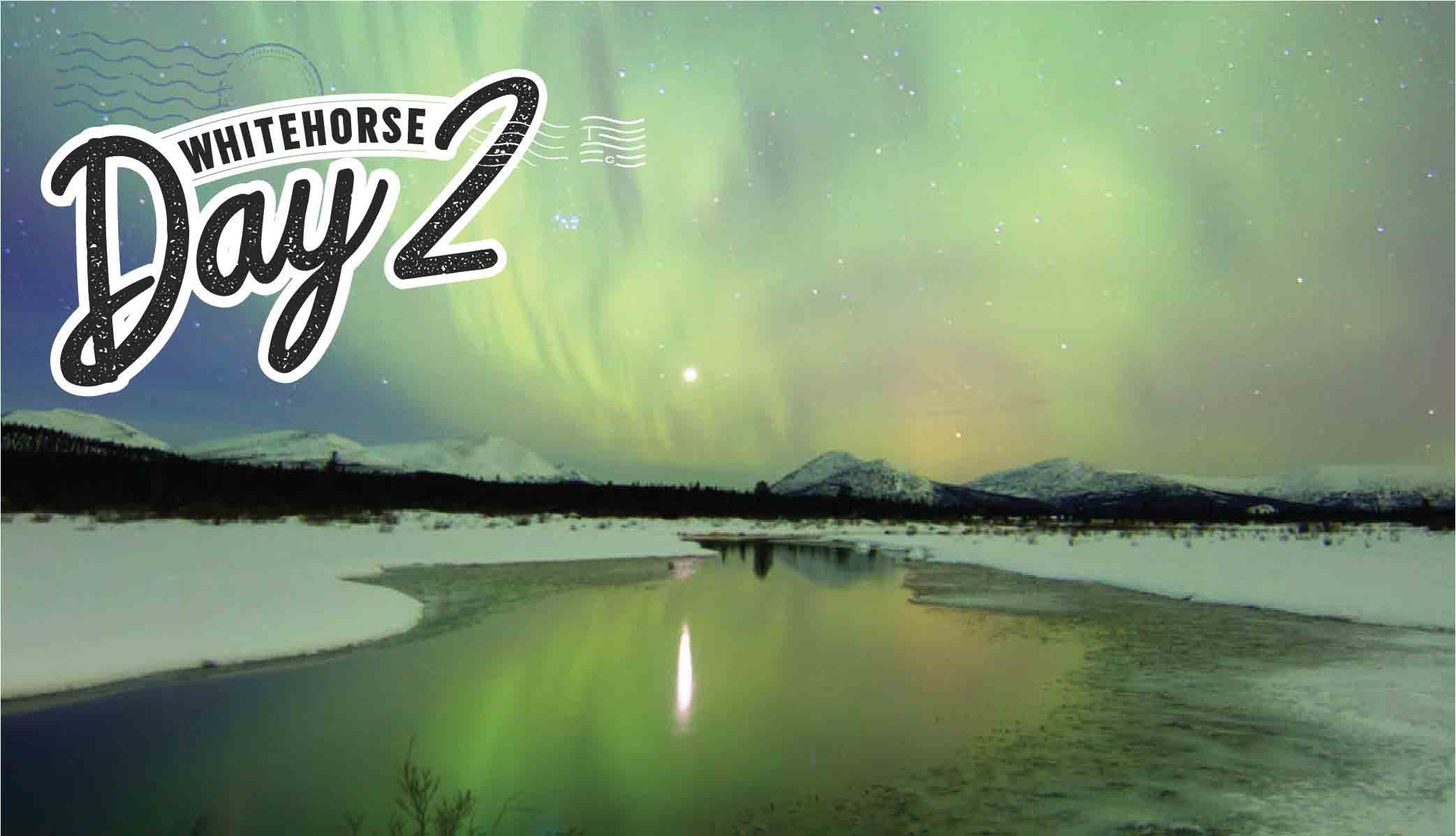 Water and snow illuminated by the Northern Lights