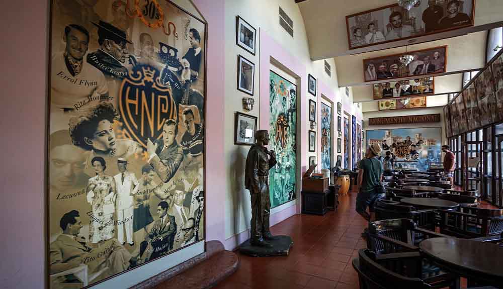 Artwork lines the walls of the Hotel National de Cuba lobby in Havana