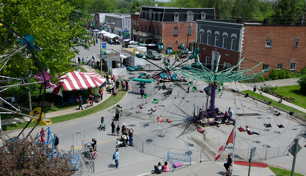 Rides are set up in the street of a town in the Kawarthas Northumerland region of Ontario.