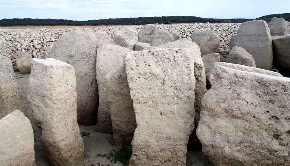 A group of large stones known as the Dolmen de Guadalperal in Spain is shown