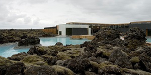 The Blue Lagoon waters are seen among a rocky coastline in Reykjavik, Iceland
