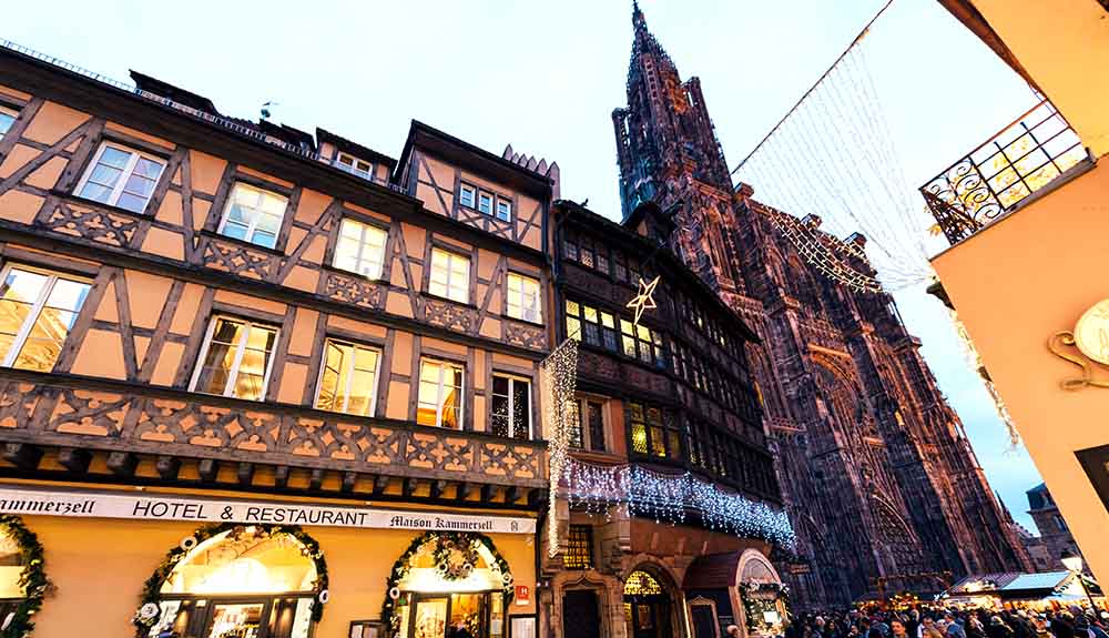 A street view of a hotel and restaurant in Strasbourg