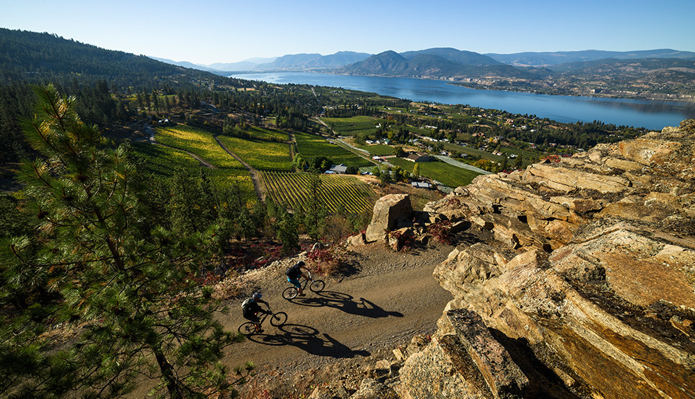 The rock expanse of the Kettle Valley Trail looking out on the beautiful waters of Okanagan Lake
