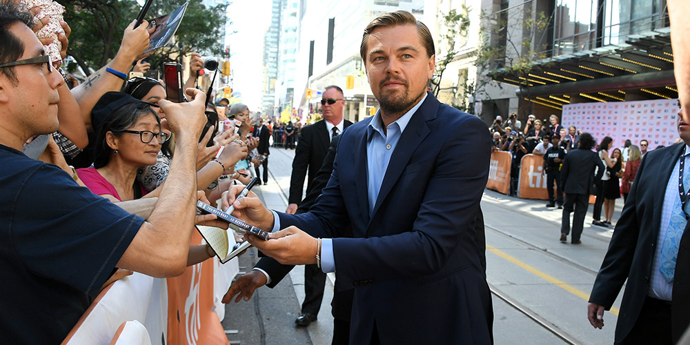 Leonardo DiCaprio signs autographs at TIFF