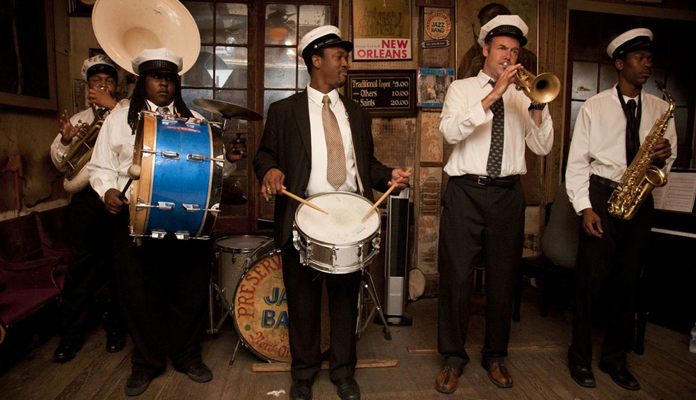 Five musicians play at Preservation Hall