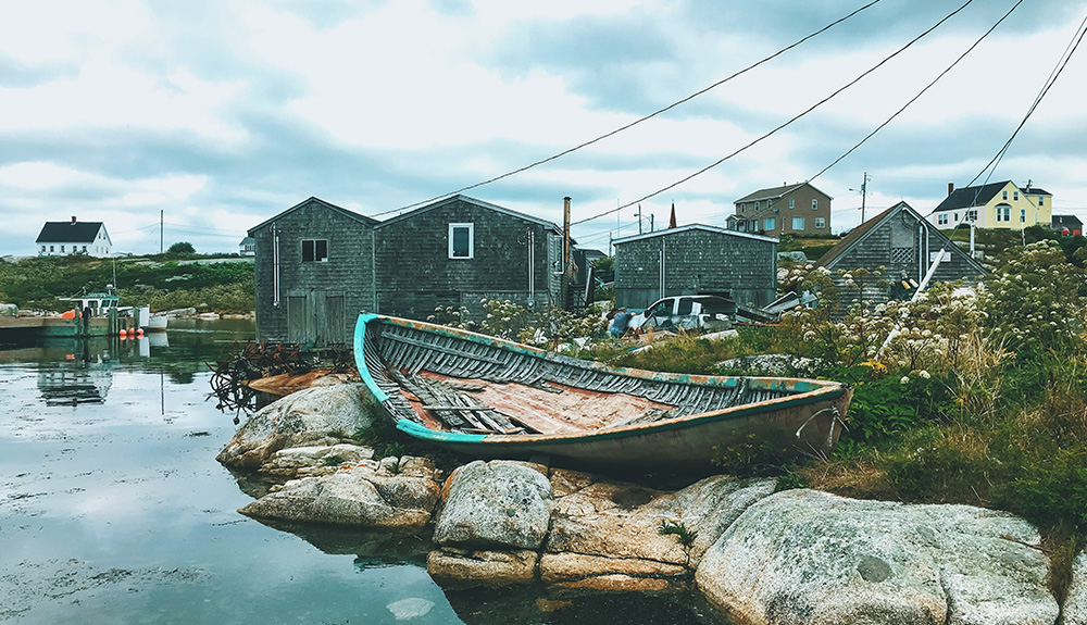 Photo submitted by Louise Johnson of a small wooden boat on the shoreline of Peggy's Cove, Nova Scotia