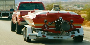Pickup truck towing a boat