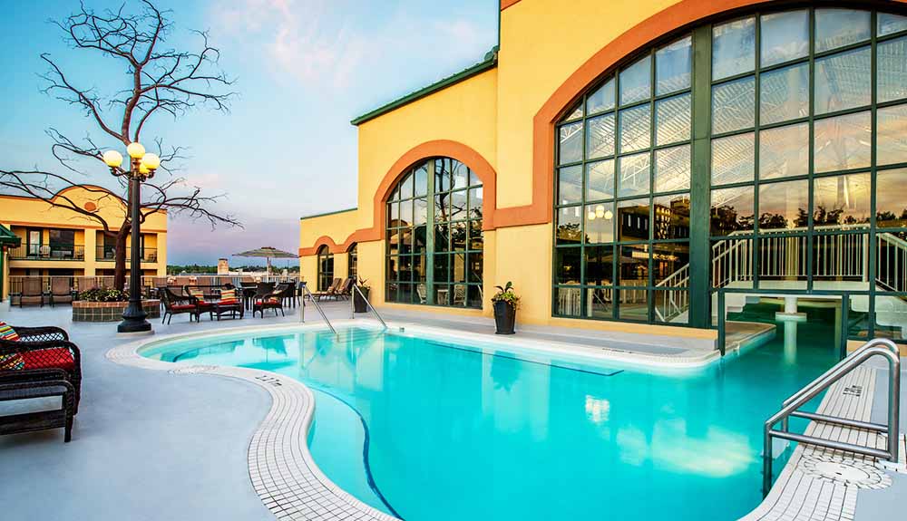 The indoor/outdoor rooftop pool at the Temple Gardens Hotel and Spa in Moose Jaw