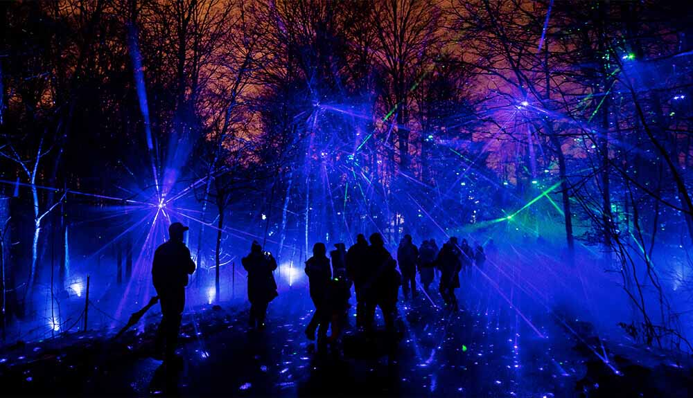 Visitors explore Terra Lumina, the Toronto Zoo's nighttime multimedia experience