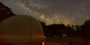 Looking over the roof of the observatory to a starry night sky at Killarney Provincial Park in Ontario